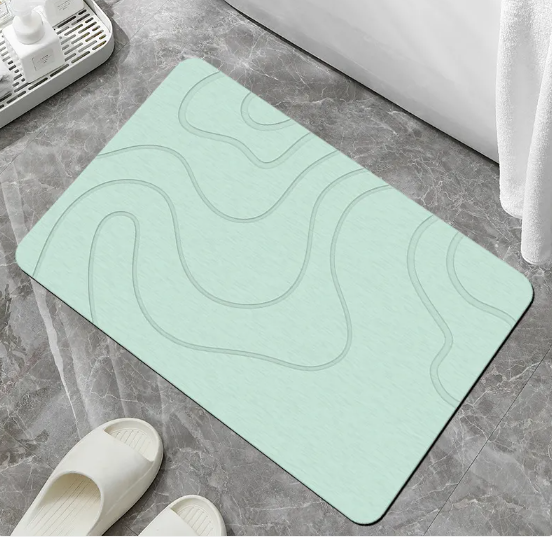 Mint green absorbent bath mat with wavy lines, non-slip bathroom rug