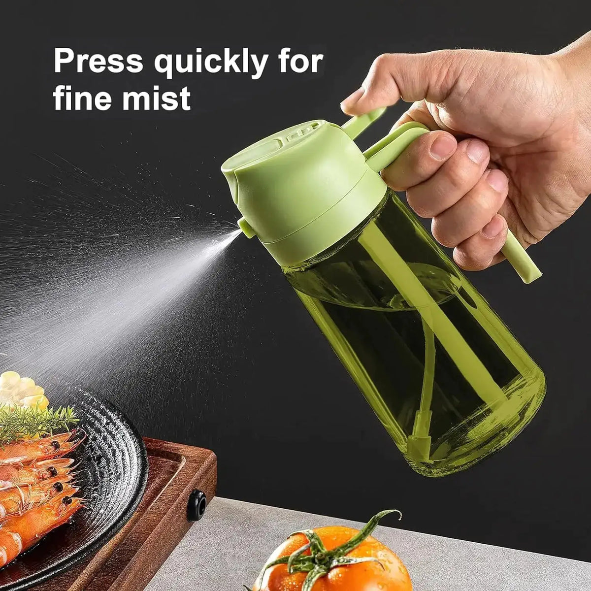 Green oil sprayer bottle spraying a fine mist of olive oil over food for air fryer cooking
