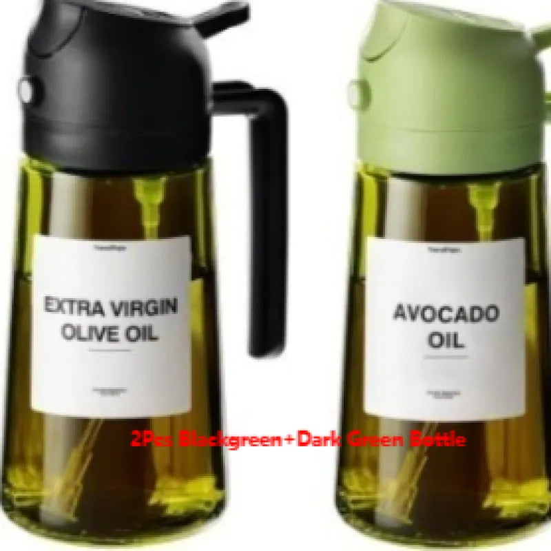 Two-pack of glass oil sprayer bottles in black and green for olive oil and avocado oil